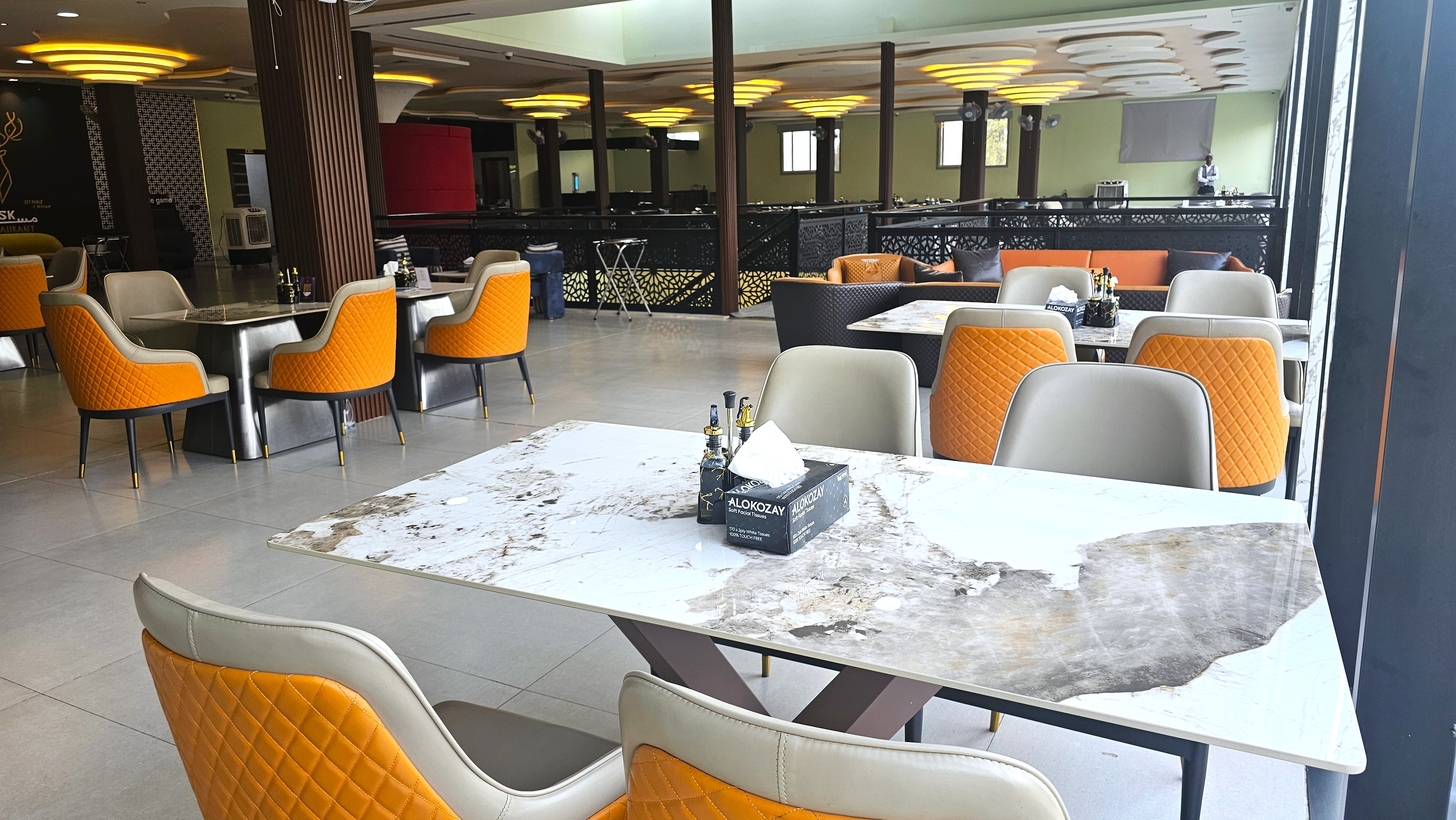 Restaurant seating on the other side of the dining area at Musk
