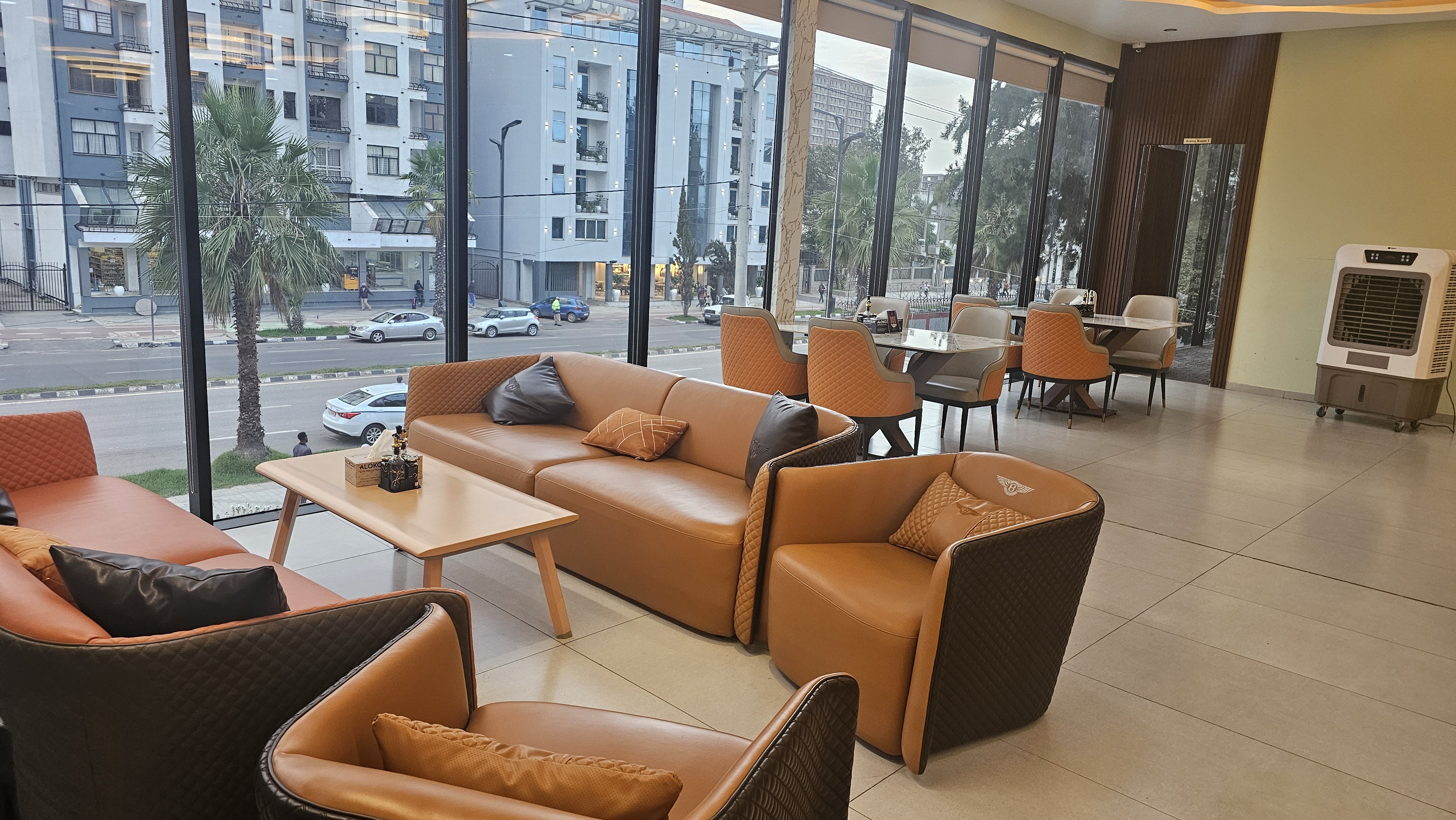 Comfortable dining sofa seating inside the restaurant at Musk